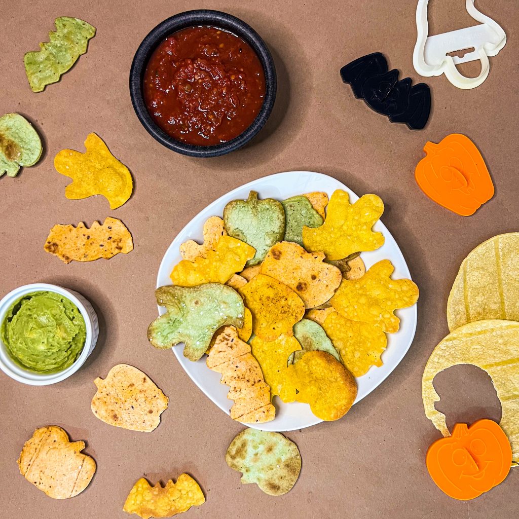 a plate of spooky chips and dips